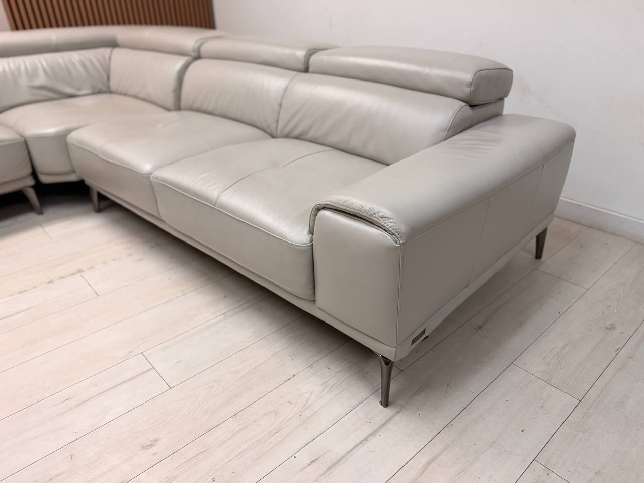 Abbyson Quinton gray top-grain leather sectional with adjustable headrests in living room