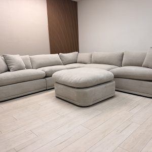 Aiden & Ivy Hartley beige fabric 6-piece modular sectional with ottoman in a Charlotte NC living room